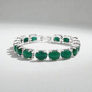 AVON Green Cat's Eye Glass Bracelet